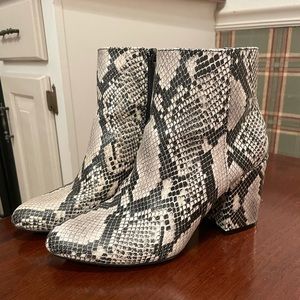heeled snakeskin boots! Brand is BamBoo and the size is 7 1/2!